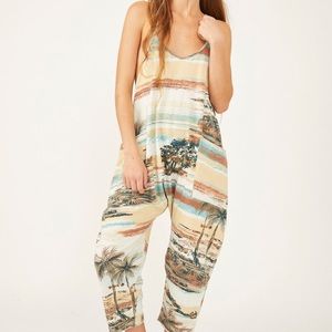 Free people. Hot shot printed onesie. Size medium. New with tags.